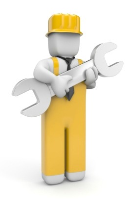 Picture of person holding spanner